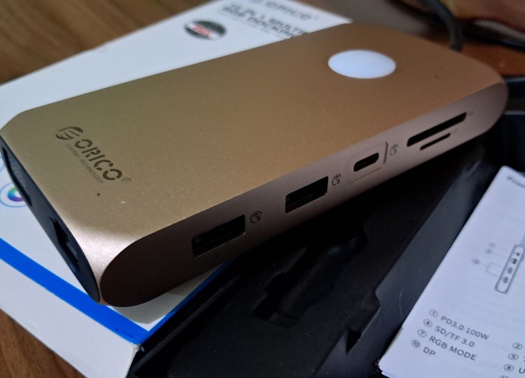 ORICO 12 in 1 Multifunctional RGB Dock (Category: Laptops & Notebooks) located in Pasig City. Submitted by jd.carousel (Listing ID 1454693357, Image 1). Description: Comes with box and manual. Specs. HDMI 4K/60hz Rose Gold color Ports; 1 Type C PD 100W, 2 USB-A 3.1, 1 USB-A 2.0, 1 Type C 3.1, 2 HDMI 2.0, 1 VGA, 1 SD/TF 3.0, 1 LAN And 1 3.5mm aux. Pickup or delivery option. Delivery fee is shouldered by the buyer. Note: there's a rubber sticker fo