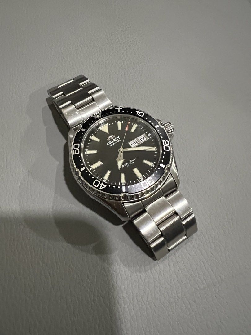 Orient Kamasu 10,000 negotiable (Category: Men's Watches) located in Quezon City. Submitted by jolie67 (Listing ID 1454750614, Image 1). Description: Selling my Orient Kamasu RA-AA0001B19B in black dial and stainless-steel bracelet. One of Orient’s most popular automatic divers, featuring a sapphire crystal, 200m water resistance, automatic F6922 movement and day/date display. Specs: * Orient Kamasu * Reference: RA-AA0001B19B * 41.8mm case * Orie