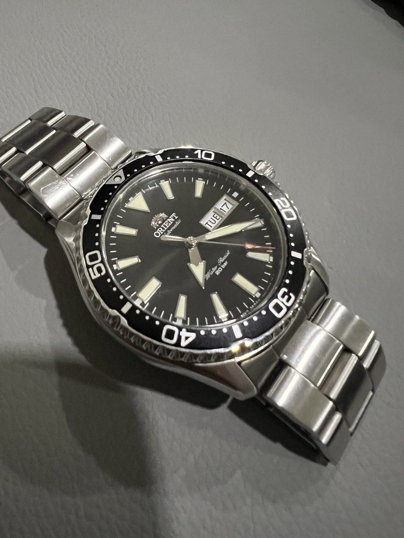 Orient Kamasu 10,000 negotiable (Category: Men's Watches) located in Quezon City. Submitted by jolie67 (Listing ID 1454750614, Image 2). Description: Selling my Orient Kamasu RA-AA0001B19B in black dial and stainless-steel bracelet. One of Orient’s most popular automatic divers, featuring a sapphire crystal, 200m water resistance, automatic F6922 movement and day/date display. Specs: * Orient Kamasu * Reference: RA-AA0001B19B * 41.8mm case * Orie