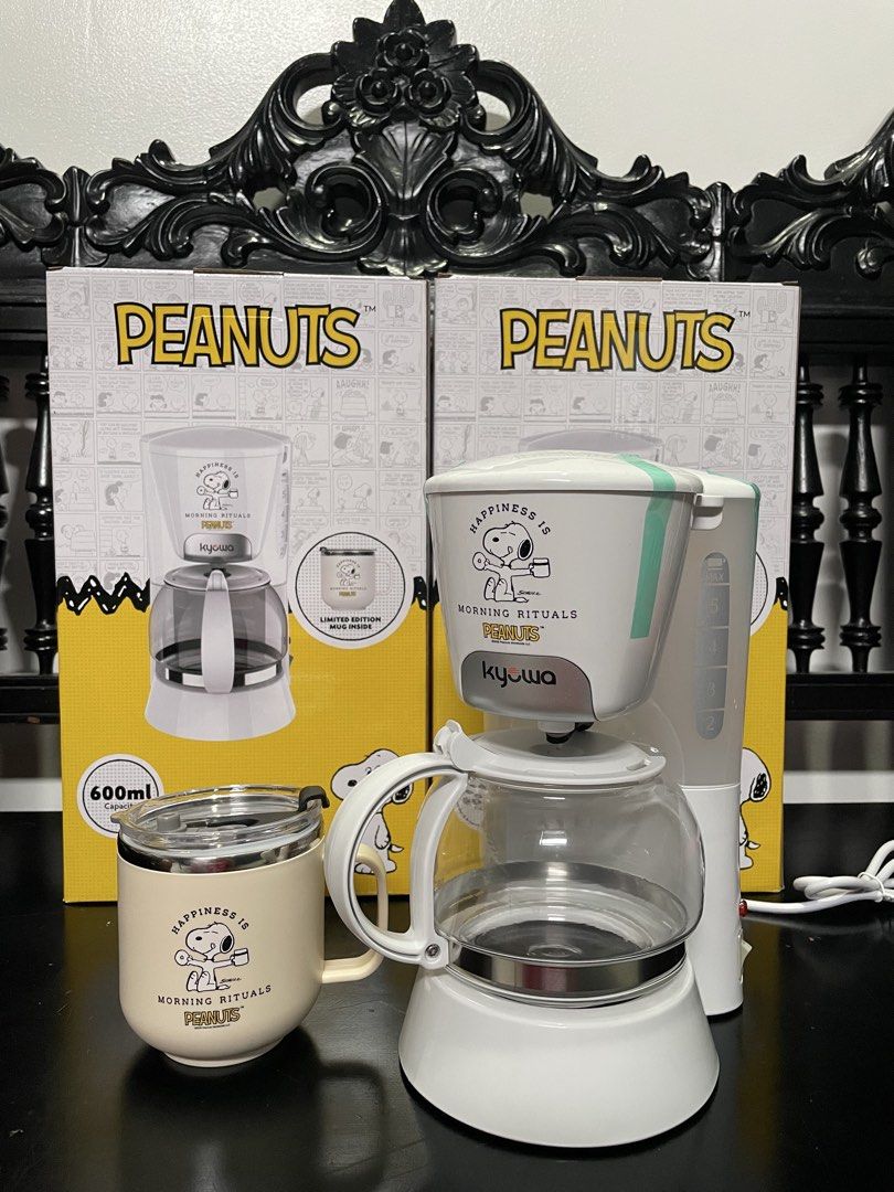 Peanuts Snoopy Coffee Maker KW-1219 with Mug (Category: Coffee & Tea Tableware) located in Bacoor. Submitted by vivbuys (Listing ID 1454613158, Image 3). Description: - Cute Peanuts coffee maker, model KW-1219 - Includes a matching Snoopy mug (limited edition!) - Makes up to 5 cups of coffee - Features a swing-type filter holder - Keep warm plate to maintain coffee temperature - Easy to clean warming plate and glass carafe - Simple on/off switch 