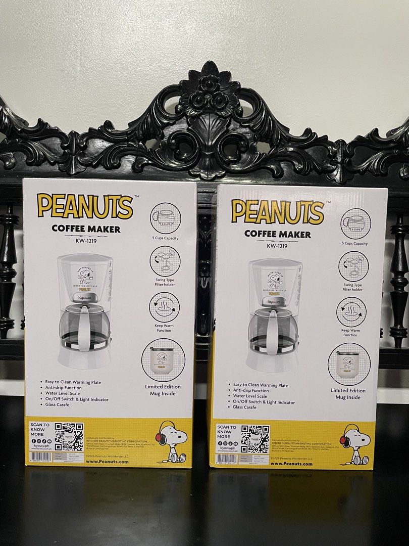 Peanuts Snoopy Coffee Maker KW-1219 with Mug (Category: Coffee & Tea Tableware) located in Bacoor. Submitted by vivbuys (Listing ID 1454613158, Image 2). Description: - Cute Peanuts coffee maker, model KW-1219 - Includes a matching Snoopy mug (limited edition!) - Makes up to 5 cups of coffee - Features a swing-type filter holder - Keep warm plate to maintain coffee temperature - Easy to clean warming plate and glass carafe - Simple on/off switch 