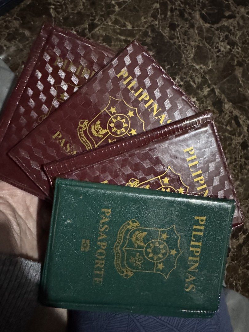Philippine Passports and Passport Covers (Category: Vintage Collectibles) located in Manila. Submitted by acluttering (Listing ID 1454658086, Image 1). Description: - Set of 3 Philippine Passports - Includes 1 green passport and 2 maroon passports - All passports feature the Philippine emblem - Perfect for collectors or as display items - Don't miss out on this unique set!.