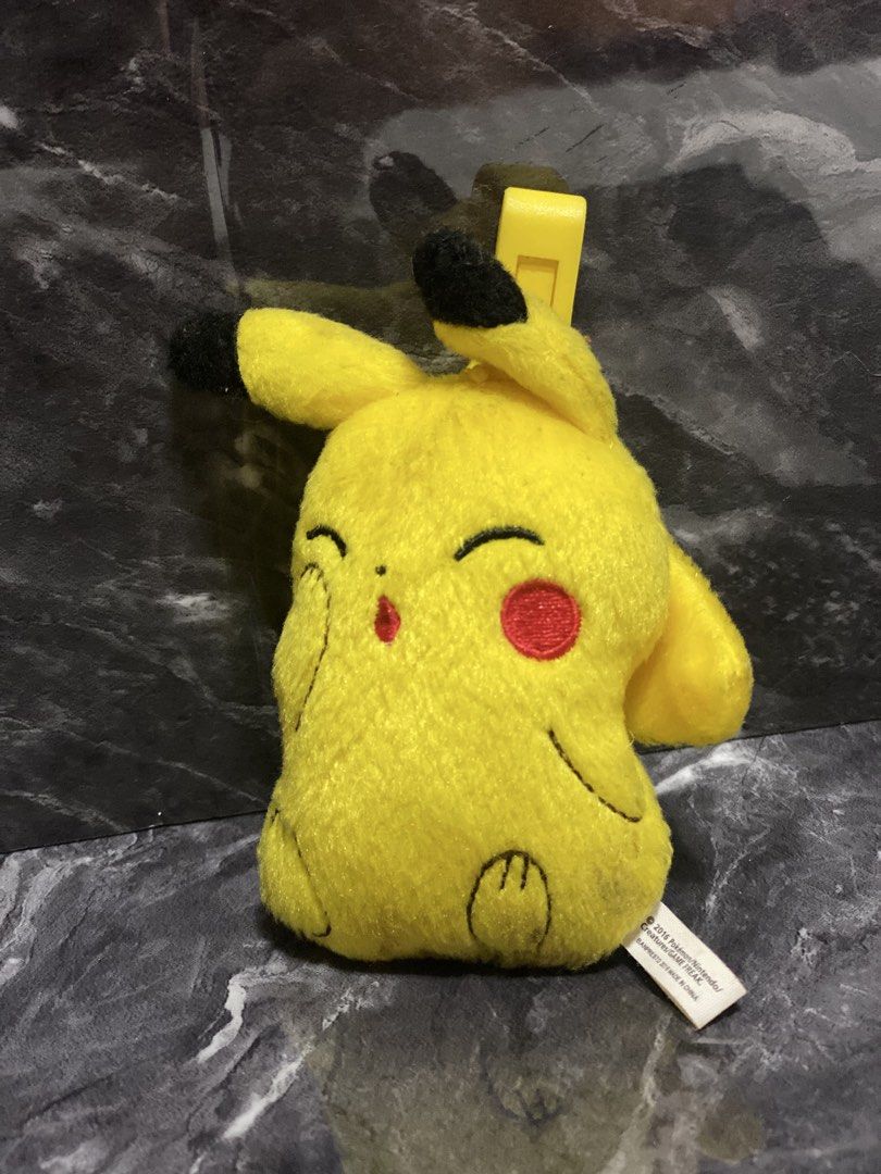 Pokemon Pikachu Plush Keychain Clip (Category: Character Goods) located in Manila. Submitted by kuya_moto (Listing ID 1454610941, Image 1). Description: - Adorable Pikachu plush toy - Features a convenient clip for attaching to bags or backpacks - Made with soft, cuddly material - Ideal for any Pokemon enthusiast - Brings a smile and brightens your day!.