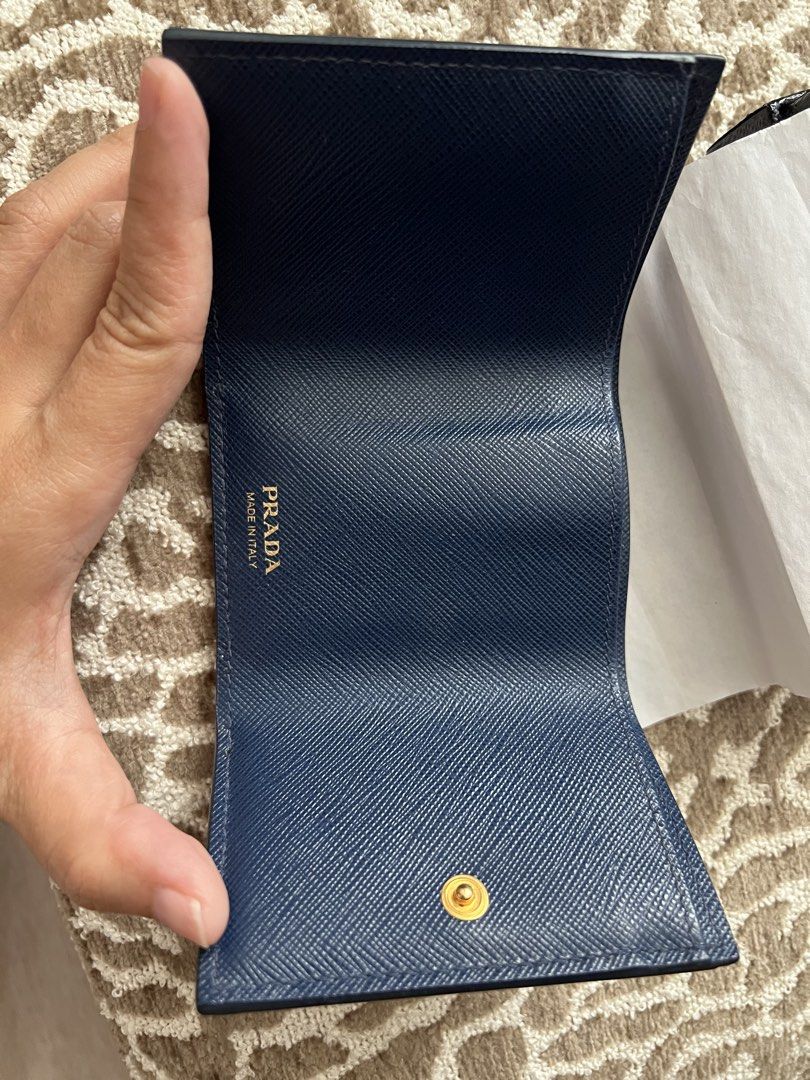 Prada Saffiano Metal Bluette Tri-fold Wallet (Category: Luxury Bags & Wallets) located in Santa Rosa. Submitted by charmainev31426 (Listing ID 1449762992, Image 3). Description: - Authentic Prada Saffiano Metal Wallet - Color: Bluette - Includes original box, authenticity card - Purchase Date: July 26, 2019 - Ideal for everyday use.