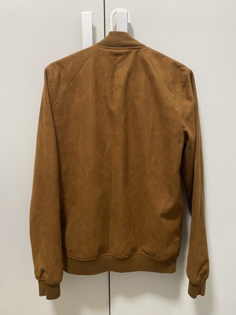 Pull & Bear Suede Bomber Jacket (Category: Coats, Jackets and Outerwear) located in Paranaque City. Submitted by thriftingclouds (Listing ID 1454675991, Image 2). Description: Brand: Pull & Bear Color: Brown Material: Suede Size: Small Measurement: 18 x 26 in No issue.