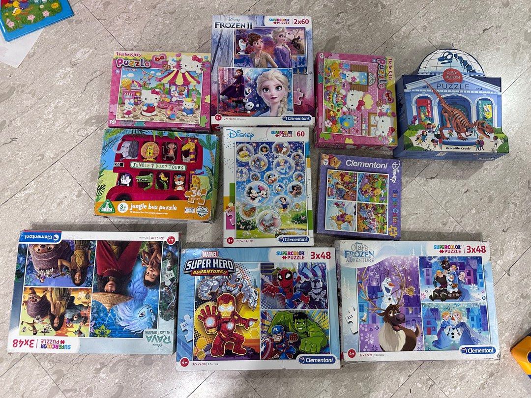 Puzzle bundle (Category: Board Games & Puzzles) located in Singapore. Submitted by Luckyclover88 (Listing ID 1454747701, Image 1). Description: $15 for all. Authentic and good quality. .