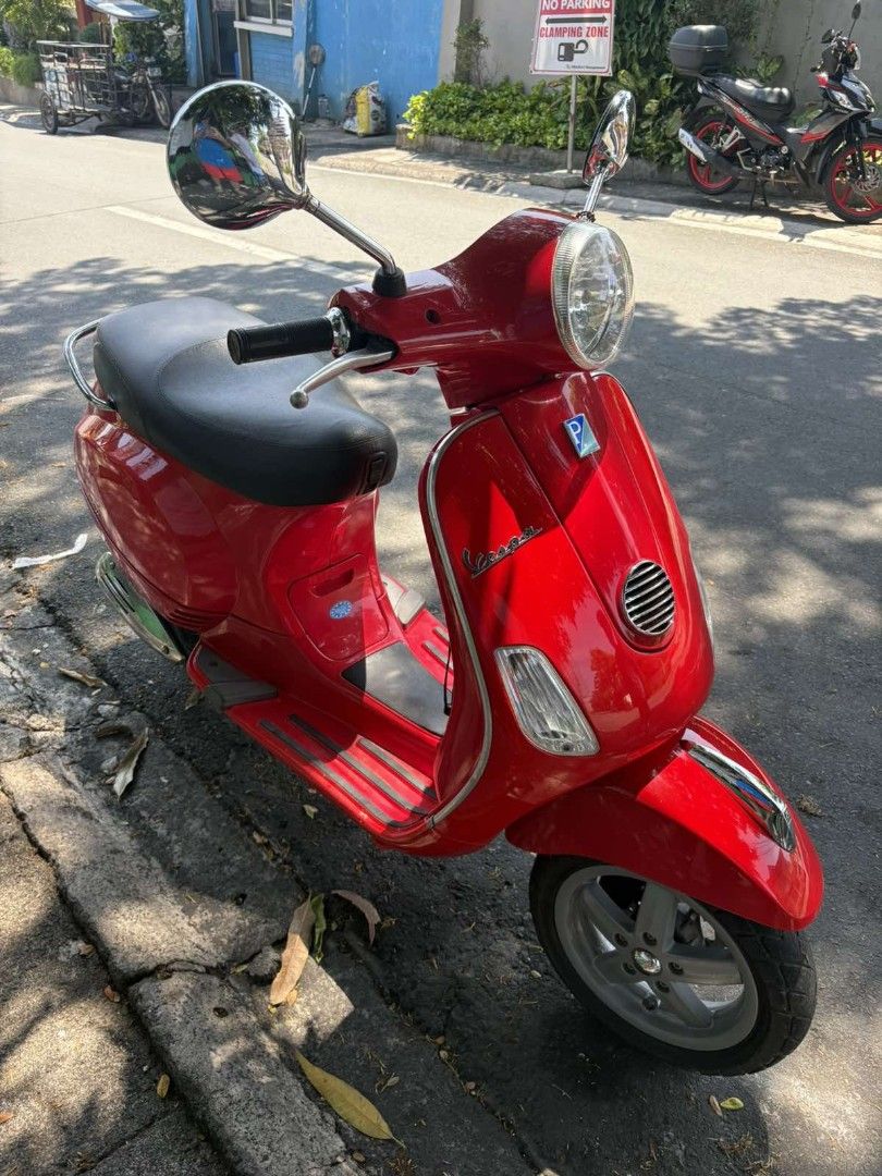 Red Vespa Scooter (Category: Skates, Rollerblades & Scooters) located in Binan City. Submitted by marv31 (Listing ID 1454563807, Image 2). Description: Classic red Vespa scooter for sale! Perfect for city cruising. Smooth ride, low mileage. Ready for its next owner! Vespa LX150 2013 Model Bright and Metallic Red Shades 7789 km Milage Price: 135,000 Open Deed of Sale.
