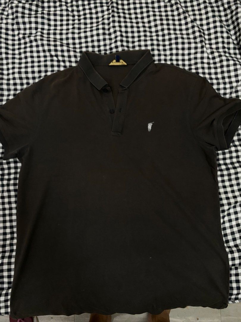 RL POLO PoloShirt with Logo - Dark Grey (Category: Tshirts & Polo Shirts ) located in Manila. Submitted by lev777 (Listing ID 1454723801, Image 2). Description: - Brand: POLO - Color: Brown - Style: Classic polo shirt - Features: Embroidered polo player logo on chest, short sleeves, two-button placket - Occasion: Casual wear Dimensions Width - 22.5 Length - 26.5 Color might vary due to lighting Issue - Discoloration RFS: Decluttering SF care of b