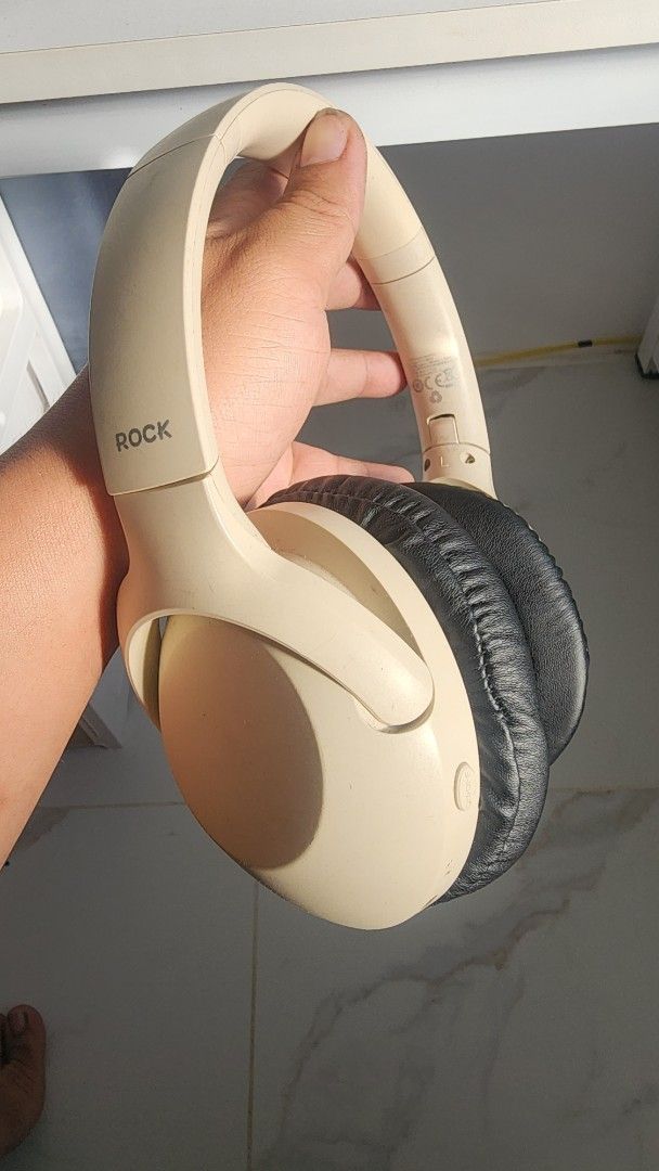 ROCK Wireless Bluetooth Headphones Beige (Category: Headphones & Headsets) located in Manila. Submitted by karlmark132527 (Listing ID 1454652543, Image 1). Description: - ROCK 03 Wireless Headphones - Color: Beige - Connectivity: Bluetooth and headphone jack - Features: On-earcup volume and playback controls - Condition: Minor signs of wear on earcups, fully functional.