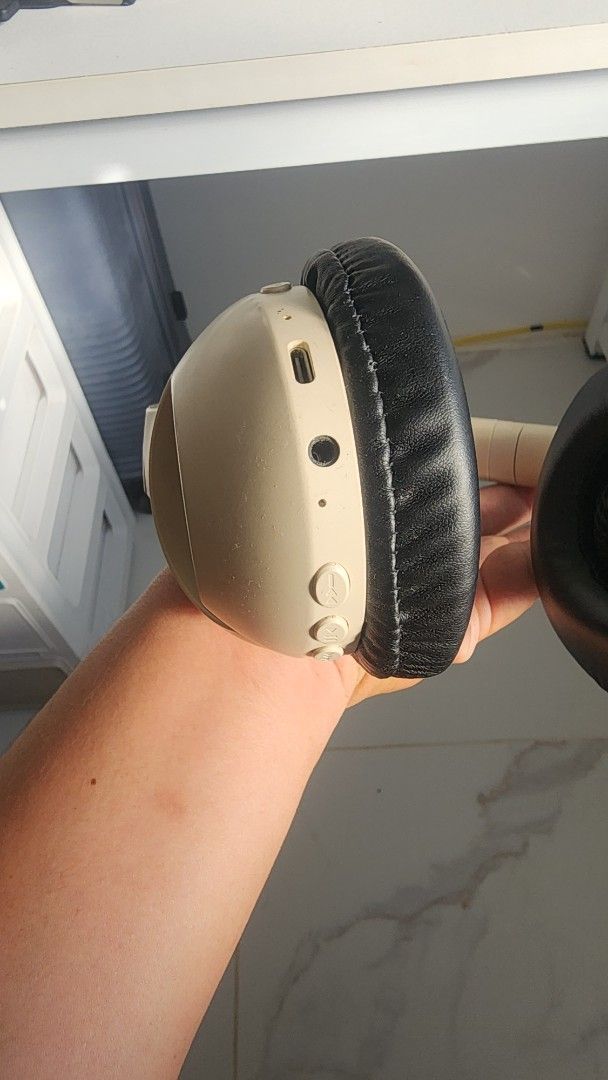 ROCK Wireless Bluetooth Headphones Beige (Category: Headphones & Headsets) located in Manila. Submitted by karlmark132527 (Listing ID 1454652543, Image 2). Description: - ROCK 03 Wireless Headphones - Color: Beige - Connectivity: Bluetooth and headphone jack - Features: On-earcup volume and playback controls - Condition: Minor signs of wear on earcups, fully functional.
