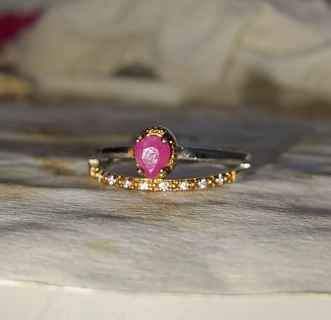 Roseblush Ruby — Natural Pear-Shaped Two-Tone Ring | Natural Ruby Ring (Category: Rings) located in Davao. Submitted by jastthings (Listing ID 1454665208, Image 2). Description: Roseblush Ruby — Natural Pear-Shaped Two-Tone Ring | Natural Ruby Ring PRODUCT DETAILS 💎 Gemstone: Natural Ruby 💧 Shape: Pear / Teardrop 📏 Stone Size: Approx. 5 × 4 mm 💍 Metal: Silver & Gold-Tone Copper Setting ✨ Accent Stones: Clear Rhinestone Accents 📐 Ring Size: A