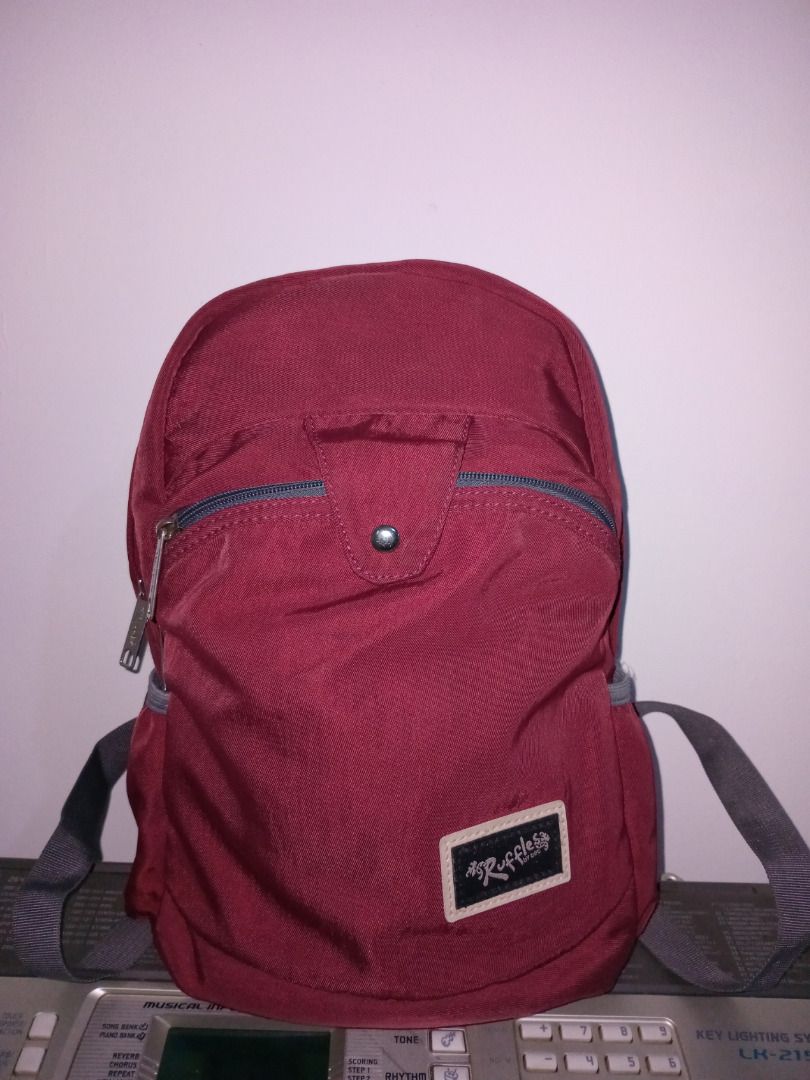 Ruffles Maroon Backpack (Category: Backpacks) located in Caloocan City. Submitted by safedeer_cd4f15 (Listing ID 1454708244, Image 1). Description: - Stylish maroon backpack with strap na umiilaw kapag may flash/light. - 2 front zippered pockets, 1 zippered pocket at the back for anti-theft. - Features a convenient front zippered pocket for quick access. - Made from durable fabric, built to last. - Offers ample space inside for all your essential