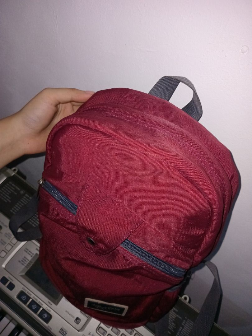 Ruffles Maroon Backpack (Category: Backpacks) located in Caloocan City. Submitted by safedeer_cd4f15 (Listing ID 1454708244, Image 2). Description: - Stylish maroon backpack with strap na umiilaw kapag may flash/light. - 2 front zippered pockets, 1 zippered pocket at the back for anti-theft. - Features a convenient front zippered pocket for quick access. - Made from durable fabric, built to last. - Offers ample space inside for all your essential