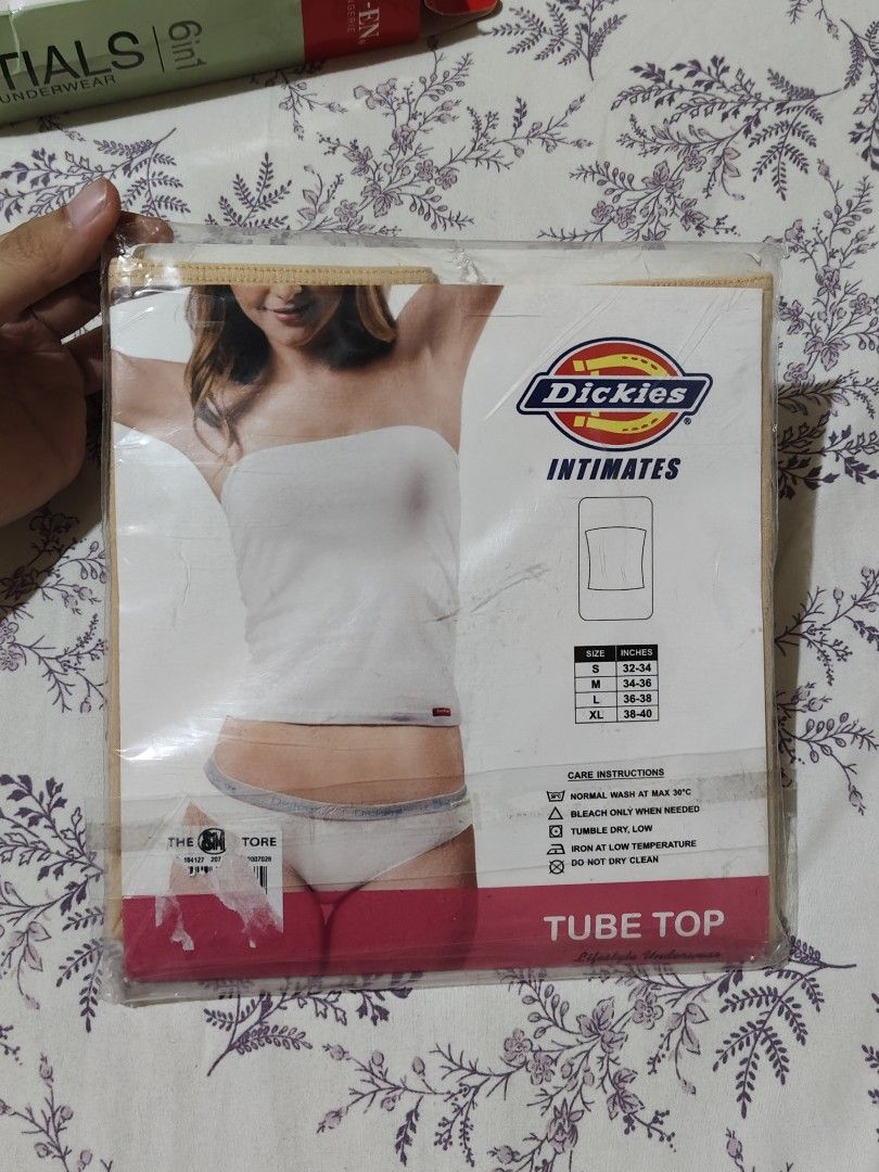 sealed Dickies brown tube top (Category: Sleeveless) located in Bulacan. Submitted by angel.decluttersx (Listing ID 1454667260, Image 2). Description: sealed brown tube top size large to XL (36-38 inches) material: 90% cotton 10% spandex (vv stretchable).