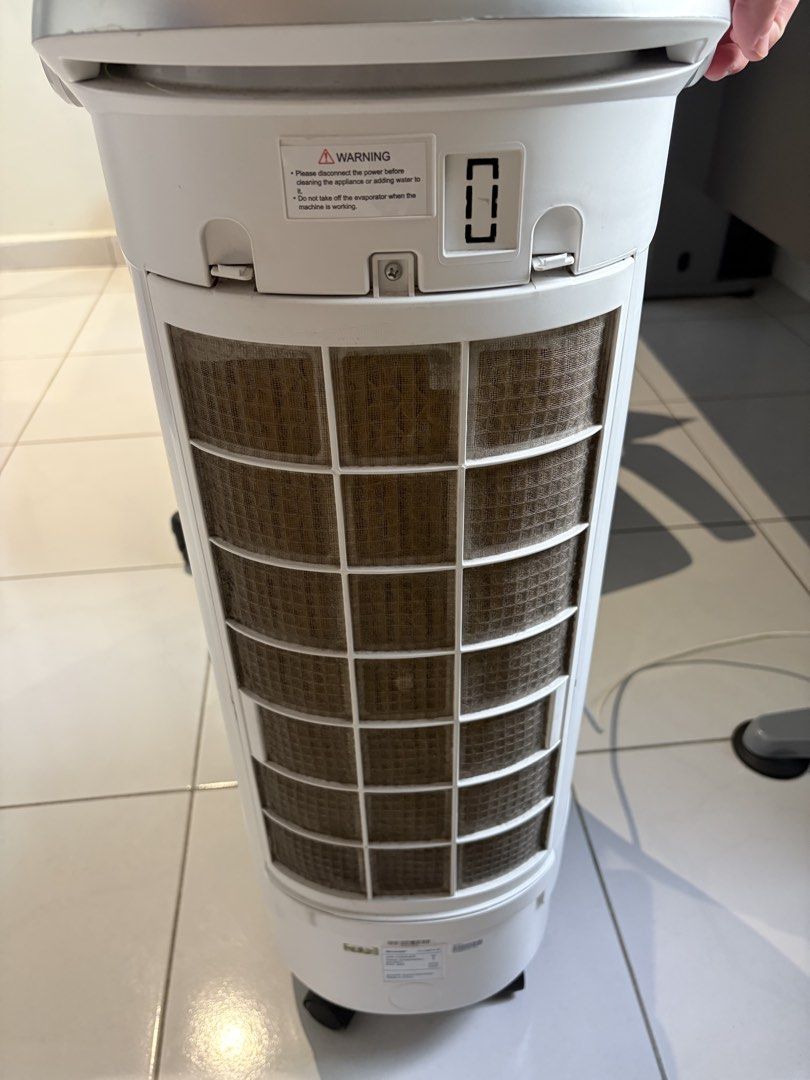 Sharp cooler (Category: Other Home Appliances) located in Kuala Lumpur. Submitted by zhaoyun0601 (Listing ID 1454673545, Image 2). Description: In Air Conditioners & Heating Description Sharp PJ-A36TV-W Air Cooler - Condition: Works well - Features: Easy-to-move wheels and has a water tank.