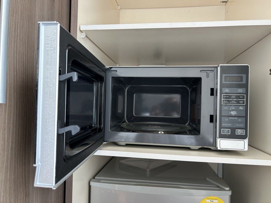 Sharp Microwave (Category: Ovens & Toasters) located in Singapore. Submitted by skgsg (Listing ID 1454641539, Image 2). Description: Sharp Microwave 20L Rarely used and it is in working condition See images attached and for the condition Condition is 10/10 Model number : 20L Basic Microwave Oven R-22A0(SM)V .
