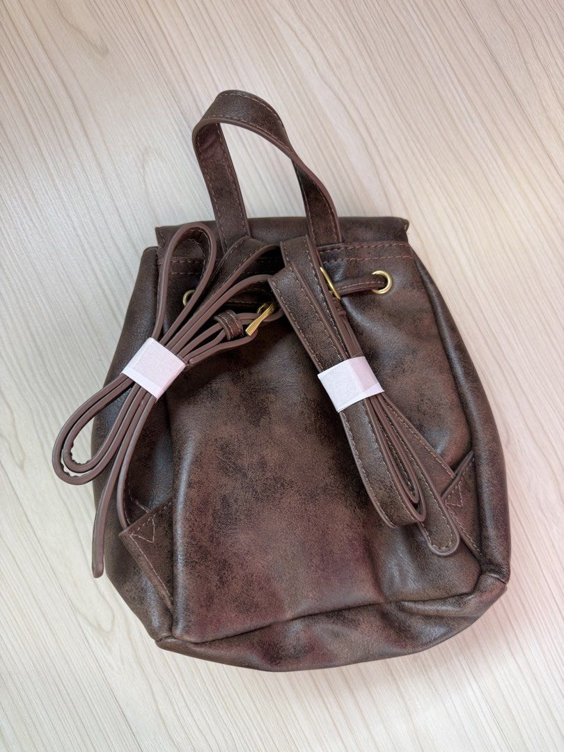 Small backpack brown (Category: Backpacks) located in Singapore. Submitted by matchasoup (Listing ID 1454570021, Image 2). Description: -bought from tb -brand new, unused -mailing (+$2) .