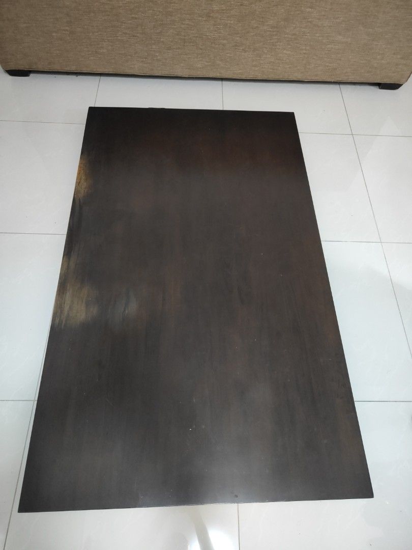 Solid wood dining table (Category: Tables & Sets) located in Singapore. Submitted by tesla2000 (Listing ID 1454604193, Image 1). Description: - Solid wood dining table with dismantled legs - Sturdy construction with a nice finish - Features natural wood grain pattern - 150cm x 90cm. Height 74cm - Wood polish damaged to one side due to use as study table, can be easily re-polished - Buyer to self collect or arrange own collection service.
