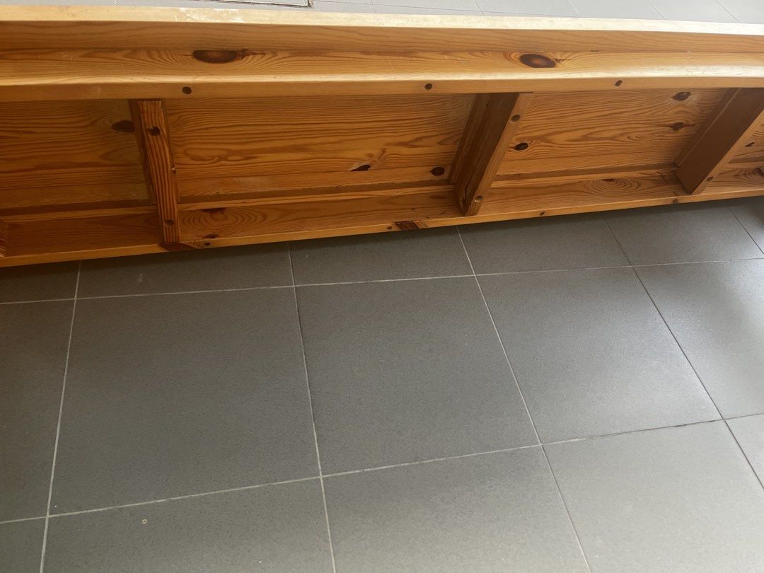 Solid Wood Pine Bench (Category: Chairs) located in Singapore. Submitted by rustycrusty (Listing ID 1454569426, Image 3). Description: - Sturdy pine wood bench - Versatile: entryway, dining, or extra seating - Unique natural wood grain and knots - Solid construction with visible joinery - Dimensions: Approx. [Length 166 cm] x [Width 36 cm]x [Height 46 cm] - Adds a rustic charm to your home - Signs of wear at bottom of legs - Pickup at my residenc