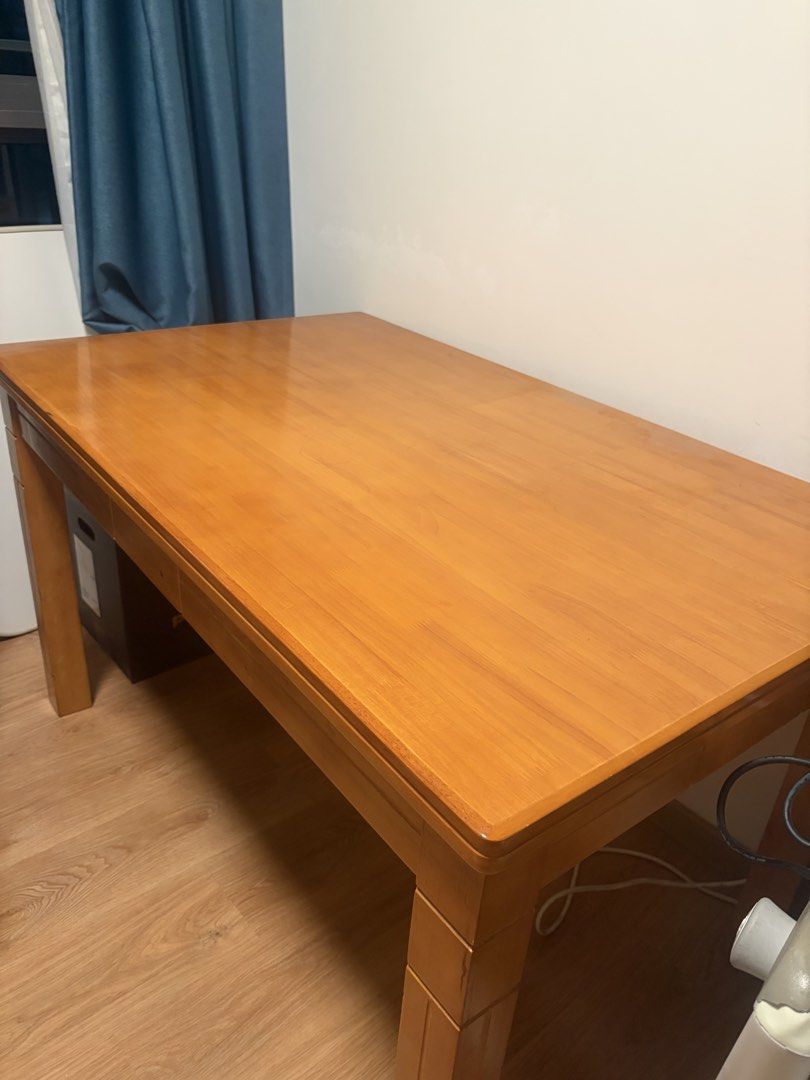 Solid wood table (Category: Tables & Sets) located in Singapore. Submitted by tracyguanguan (Listing ID 1454609824, Image 3). Description: 130x80cm, good for dinning and study .