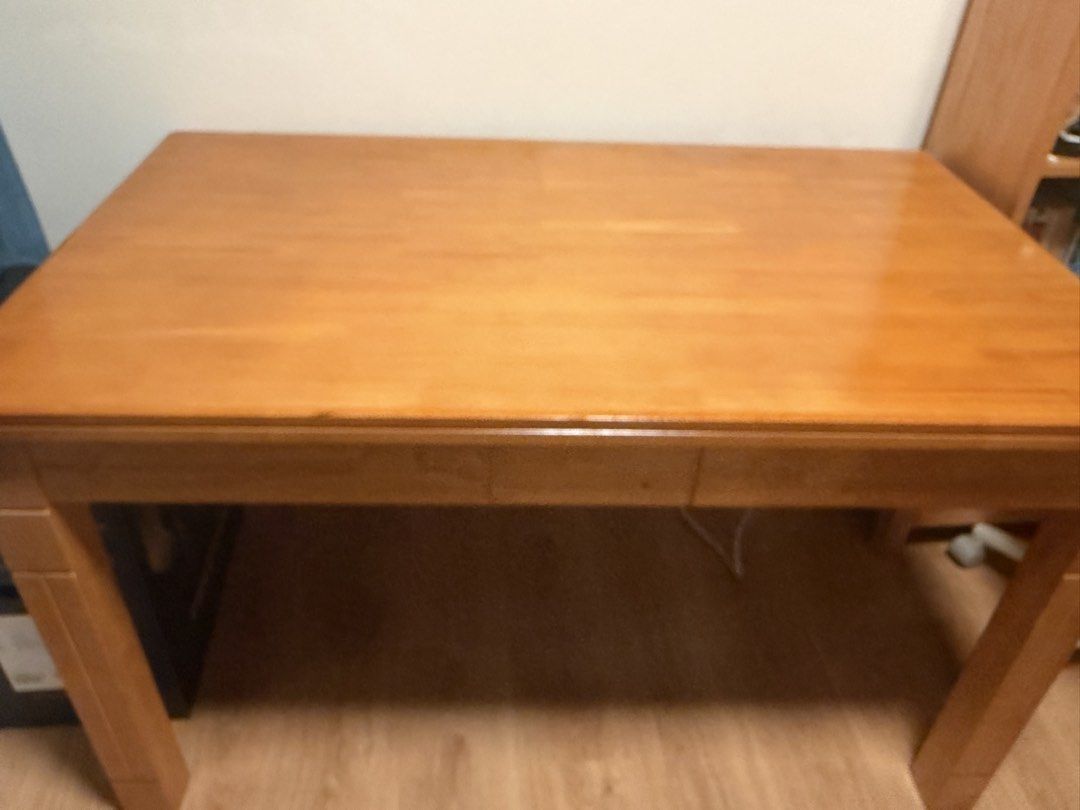 Solid wood table (Category: Tables & Sets) located in Singapore. Submitted by tracyguanguan (Listing ID 1454609824, Image 2). Description: 130x80cm, good for dinning and study .