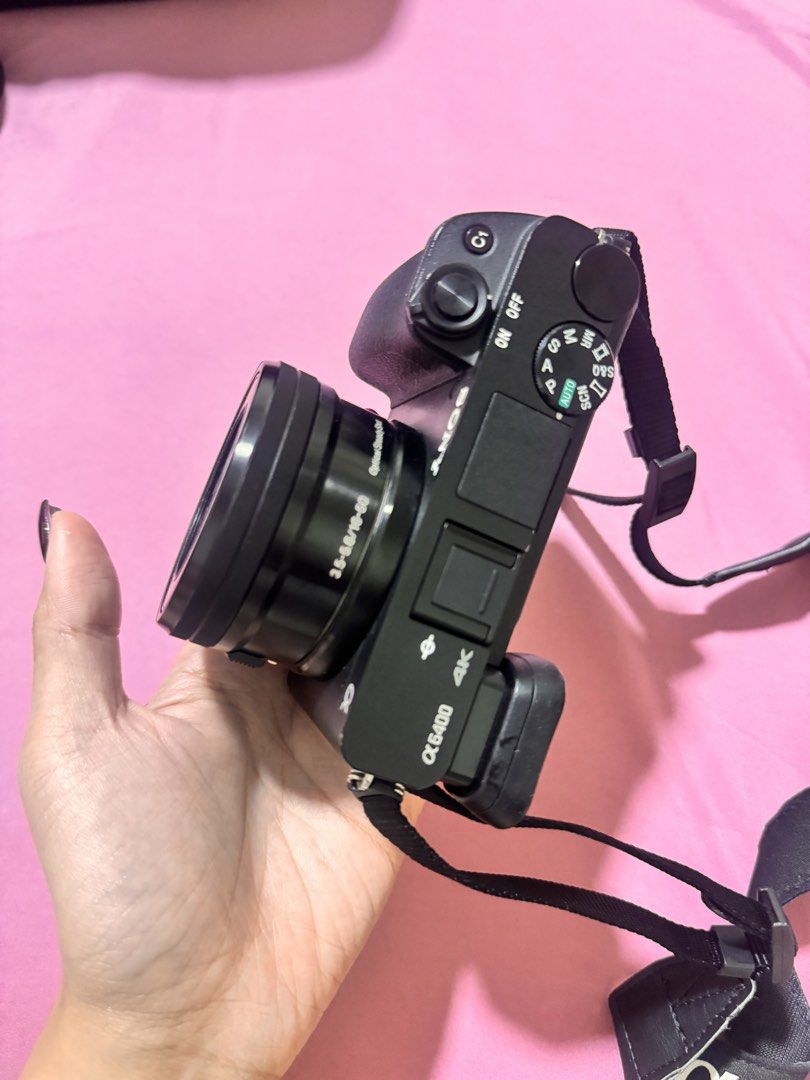 Sony Alpha a6400 Mirrorless Camera with 16-50mm kit Lens (Category: Cameras) located in Manila. Submitted by angelea0906 (Listing ID 1454727263, Image 2). Description: Sony A6400 with Kit Lens – Inclusions: * Sony A6400 body * Kit lens * Original battery * Charger & USB cable * Sony camera strap * FREE metal grip Key Features: * 24.2MP APS-C CMOS sensor * 425-point phase-detection autofocus * Fast and accurate Eye AF * 4K UHD video recording up t