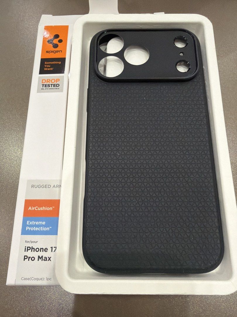 Spigen- iPhone 17 Pro Max (Category: Cases & Sleeves) located in Quezon City. Submitted by captal (Listing ID 1454609172, Image 1). Description: - Brand: Spigen - Compatible with: iPhone 17 Pro Max - Protection: Drop tested (MIL-STD 810G-516.6) with Air Cushion technology - Condition: Used - Features: Textured grip, extreme protection.