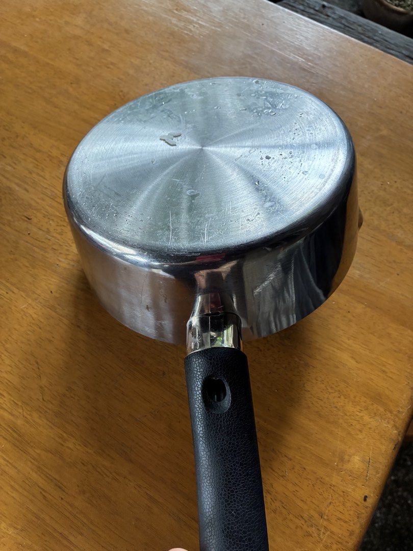 Stainless Steel Saucepan with Black Handle (Category: Cookware & Accessories) located in Cavite. Submitted by secondhandnook (Listing ID 1454563711, Image 3). Description: - Durable stainless steel construction - Stylish dark pink interior - Securely attached black handle - Ideal for sauces and heating small portions - Ready for a new home!.