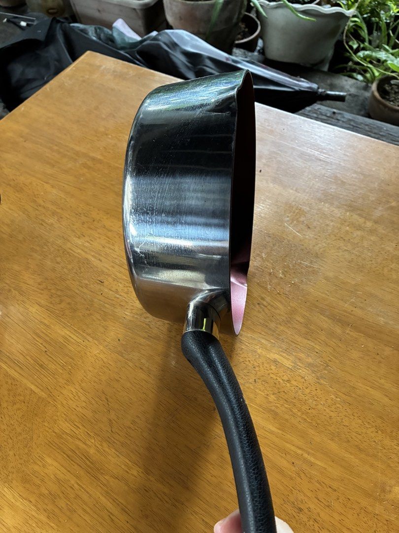 Stainless Steel Saucepan with Black Handle (Category: Cookware & Accessories) located in Cavite. Submitted by secondhandnook (Listing ID 1454563711, Image 2). Description: - Durable stainless steel construction - Stylish dark pink interior - Securely attached black handle - Ideal for sauces and heating small portions - Ready for a new home!.
