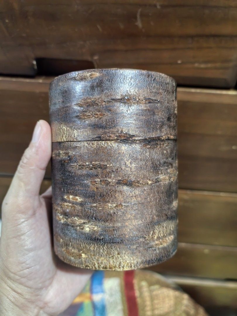 Tea Caddy (Category: Food Organization & Storage) located in Cebu City. Submitted by dudes_villanueva (Listing ID 1454715870, Image 1). Description: Tea Caddy 📌 handcrafted in Japan, featuring a rustic natural bark exterior designed to regulate humidity for storing tea The canister is made from the bark of a cherry tree, polished to reveal its natural texture 📌 It is constructed to be airtight, helping to keep tea leaves fresh and dry. 📌 These