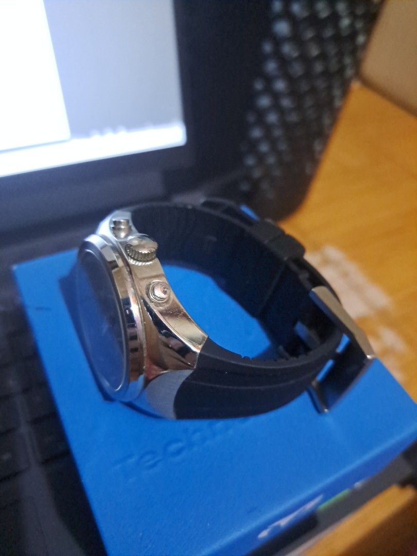 TechnoMarine MoonSun Chronograph Watch (Category: Men's Watches) located in Makati City. Submitted by lokaltisoy.1274 (Listing ID 1453003443, Image 3). Description: - Authentic TechnoMarine watch - Black dial with silver accents - Chronograph function - Comes with original box - Rubber strap with buckle closure - Versatile for everyday or special occasions.