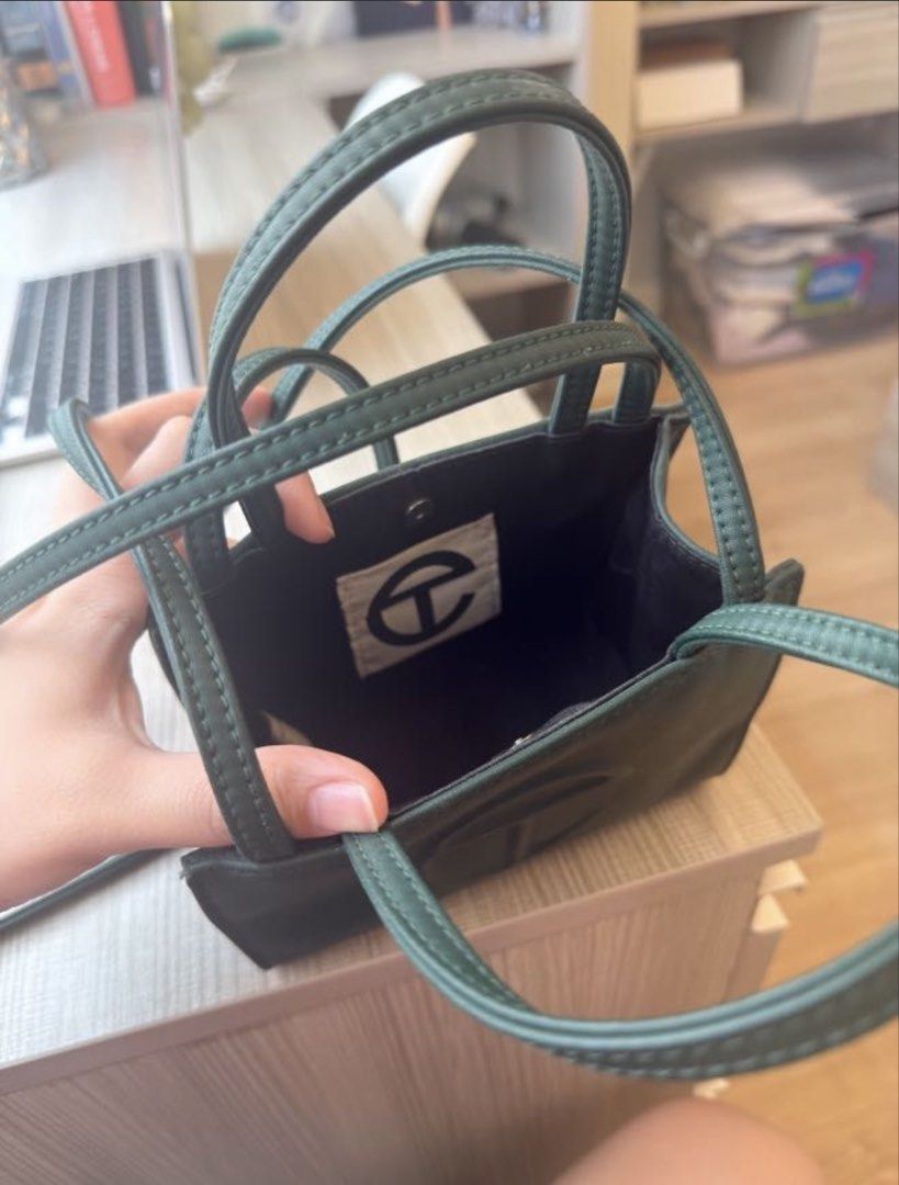 telfar small shopping bag dark olive (Category: Luxury Bags & Wallets) located in Cebu City. Submitted by plsbuymyclothes (Listing ID 1412292403, Image 3). Description: bought for 10,350 @eightmile.ph in ig slightly used rfs: declutterring .
