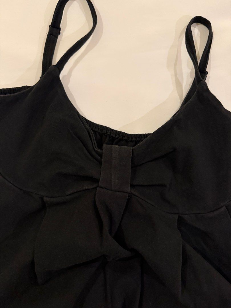 Thrifted Black Cami Top with Bow Detail (Category: Sleeveless) located in Muntinlupa City. Submitted by sabnava (Listing ID 1454739754, Image 2). Description: - Fits m-xl (can fit s too but baggy) - Thrifted in london - Bought for ₱2,300 - No tags/brand - A little washed out, but good condition!.