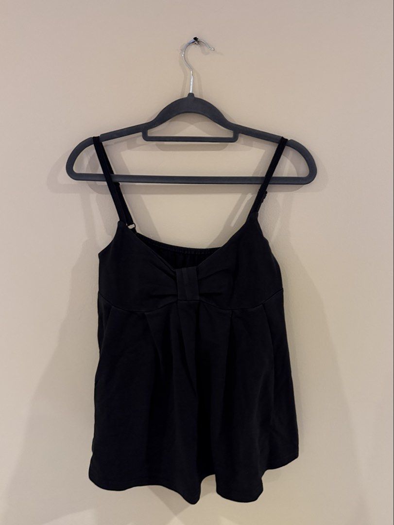 Thrifted Black Cami Top with Bow Detail (Category: Sleeveless) located in Muntinlupa City. Submitted by sabnava (Listing ID 1454739754, Image 1). Description: - Fits m-xl (can fit s too but baggy) - Thrifted in london - Bought for ₱2,300 - No tags/brand - A little washed out, but good condition!.