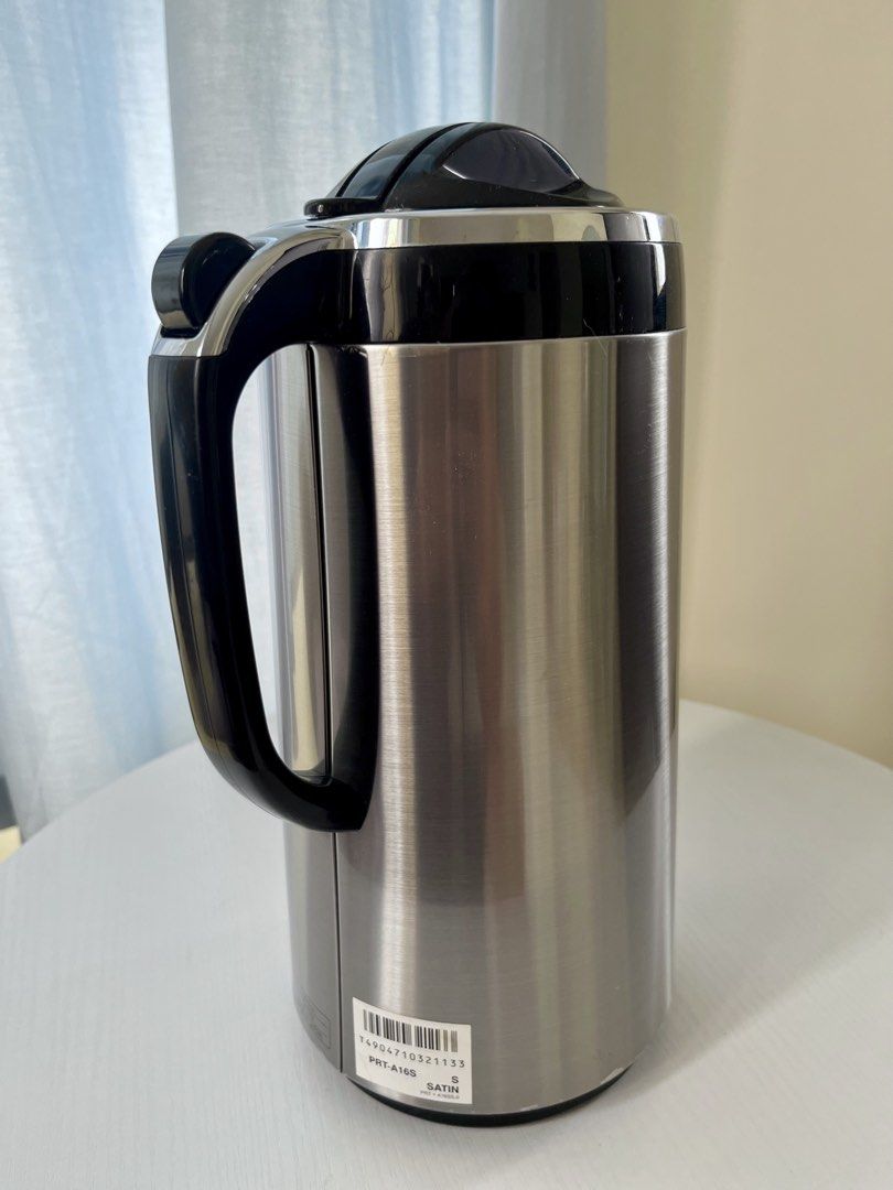 Tiger Stainless Steel Thermos (Category: Pitchers & Dispensers) located in Manila. Submitted by radius07 (Listing ID 1454591657, Image 3). Description: Made in Japan Model: PRT-A10S Capacity: 1.59L (54 oz) Temperature Retention: 58/72C (24h/10h) Color: stainless steel finish Open/Close lock button on the handle Glass liner interior RFS: rarely used.