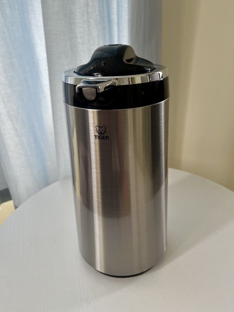 Tiger Stainless Steel Thermos (Category: Pitchers & Dispensers) located in Manila. Submitted by radius07 (Listing ID 1454591657, Image 2). Description: Made in Japan Model: PRT-A10S Capacity: 1.59L (54 oz) Temperature Retention: 58/72C (24h/10h) Color: stainless steel finish Open/Close lock button on the handle Glass liner interior RFS: rarely used.