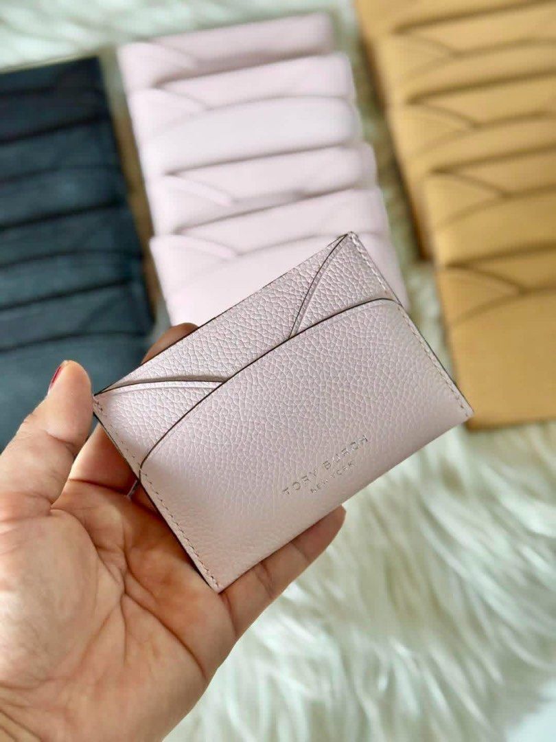 Tory Burch Card Holder - Black, Pink, Tan (Category: Wallets & Card holders) located in Manila. Submitted by clairetot (Listing ID 1454608036, Image 3). Description: Tory Burch card holder in black, light pink, or tan. Pebbled leather with multiple card slots. Compact and stylish organization for your essentials..