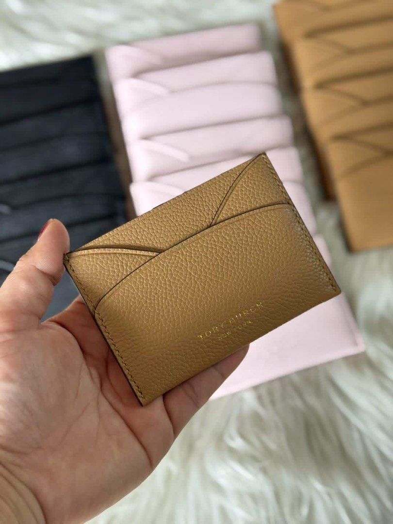 Tory Burch Card Holder - Black, Pink, Tan (Category: Wallets & Card holders) located in Manila. Submitted by clairetot (Listing ID 1454608036, Image 2). Description: Tory Burch card holder in black, light pink, or tan. Pebbled leather with multiple card slots. Compact and stylish organization for your essentials..