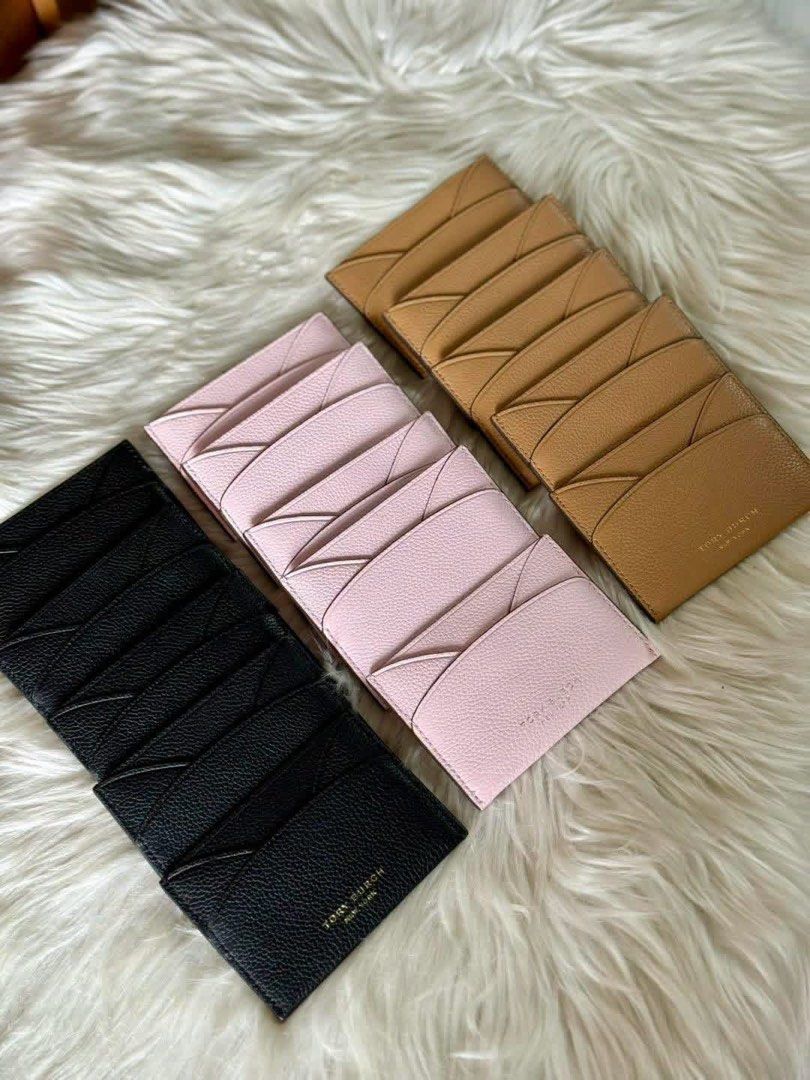 Tory Burch Card Holder - Black, Pink, Tan (Category: Wallets & Card holders) located in Manila. Submitted by clairetot (Listing ID 1454608036, Image 1). Description: Tory Burch card holder in black, light pink, or tan. Pebbled leather with multiple card slots. Compact and stylish organization for your essentials..