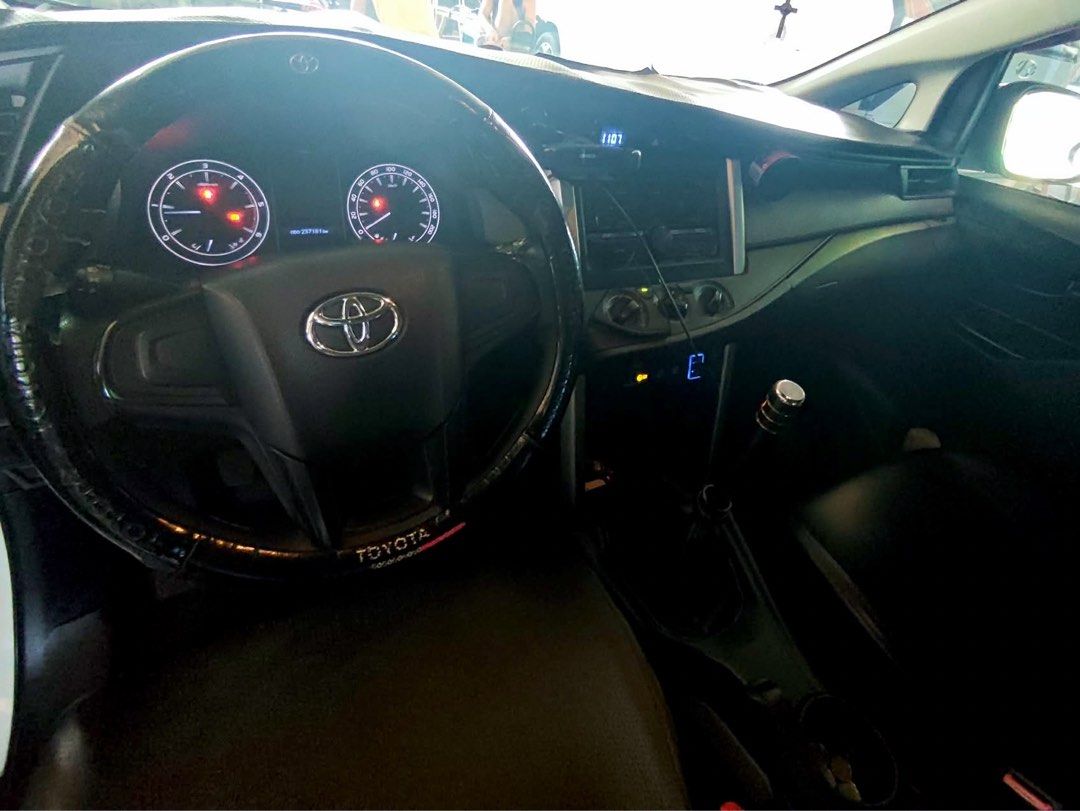 Toyota Innova (Category: Used Cars) located in Makati City. Submitted by Shannee (Listing ID 1454650926, Image 2). Description: FOR SALE:Toyota Innova J 2.8 /2020 Maayos na inalagaan at personal use.Owner moving abroad ☎️09651645817/ ✅ Toyota Innova J ✅ Manual Transmission ✅ Diesel Engine (Matipid sa krudo) ✅ White Pearl Color ✅ 200,000+ Odometer (Well-maintained) ✅Complete papers ready to transfer ✅ First Owner ✅ Good Running Condition ✅ Leather