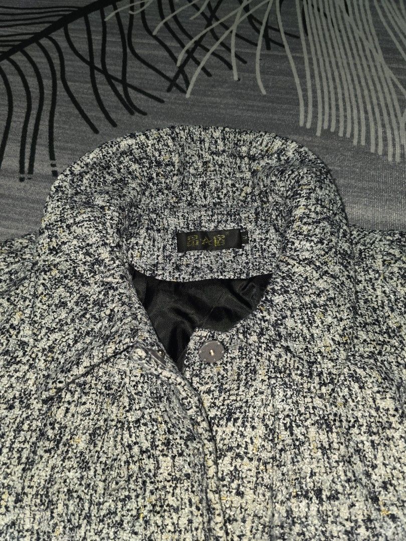 Tweed Jacket (Category: Coats, Jackets and Outerwear) located in Singapore. Submitted by fancy_thing (Listing ID 1454726513, Image 3). Description: - Classic tweed jacket - Features black, white, and gold flecks - Cropped style, ideal for layering - Approx. measurements: Chest 19 inches, Length 23 inches.