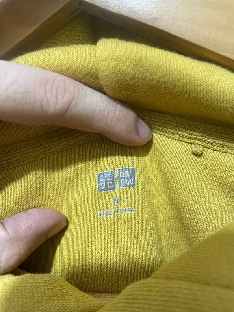 Uniqlo Pullover Hoodie (Category: Hoodies) located in Caloocan City. Submitted by alysoncala70121 (Listing ID 1454581682, Image 3). Description: - Uniqlo Hoodie - Color: Mustard Yellow - Size: Medium (M) - Material: Comfortable fabric - Design: Classic, simple hoodie - Features: Drawstring hood, ribbed cuffs and hem - Perfect for: Casual wear - Origin: Made in China.