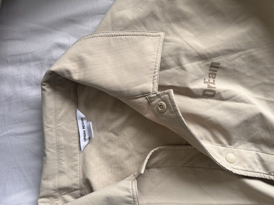 Urban Revivo Jacket (Category: Coats, Jackets and Outerwear) located in Manila. Submitted by ffaayee (Listing ID 1454732812, Image 2). Description: - Brand: Urban Revivo - Type: Jacket - Color: Beige - Size: L (EU 52 / UK 42 / US 42) - Condition: lightly used with some pen stains (see photos).
