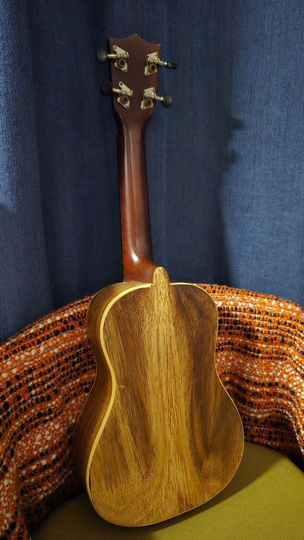 Used Fernando Ukulele (Category: Musical Instruments) located in Manila. Submitted by oceancadwaller (Listing ID 1454726565, Image 3). Description: Pre-loved Fernando ukulele with a beautiful natural wood finish. Filipino-made and has a classic vintage look. Brand: Fernando Type: Ukulele Condition: Used Material: Wood Strings: 4 Has visible signs of age and use, including scratches/surface marks. Please check all photos for the actual condition. 