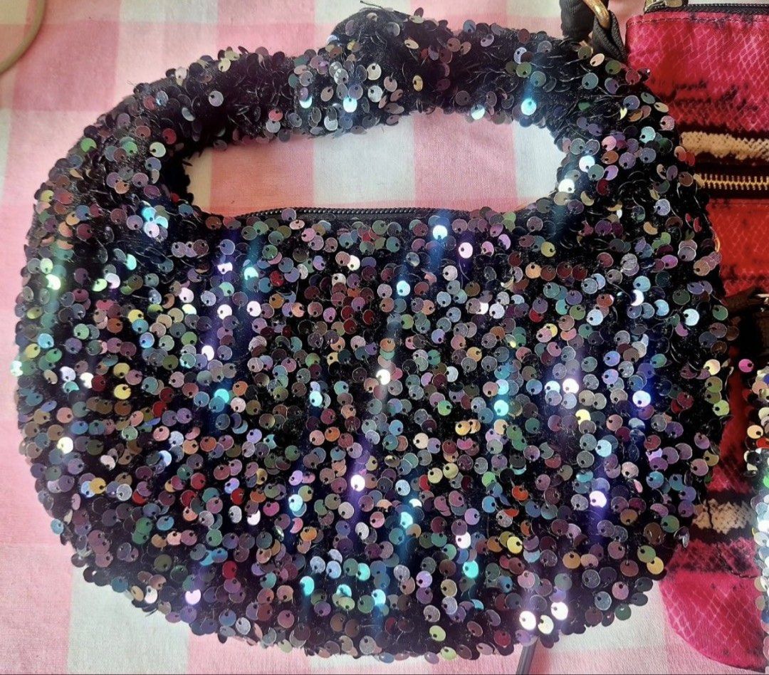 Victoria's Secret & Sequin Handbags Bundle (Category: Luxury Bags & Wallets) located in Batangas. Submitted by melocollects (Listing ID 1454599786, Image 3). Description: - Bundle of 3 cute bags - Pink Victoria's Secret crossbody with snake print - Colorful sequin Victoria's Secret pouch - Black sequin mini bag - Great for going out or adding sparkle - All zippers in good working condition.