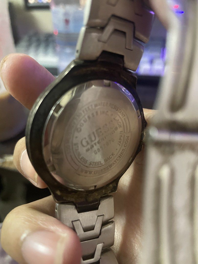 Vintage Guess Waterpro Watch (Category: Men's Watches) located in Manila. Submitted by 2002kid (Listing ID 1454687266, Image 2). Description: vintage GUESS Waterpro chronograph Color: Two tone Silver and Gold watch featuring a two-tone silver and gold stainless steel design with a black dial. The watch is rated for 50 meters (165 feet) of water resistance.It includes a rotating bezel and analog quartz movement. Issue: Need Polish And Fix Not Work