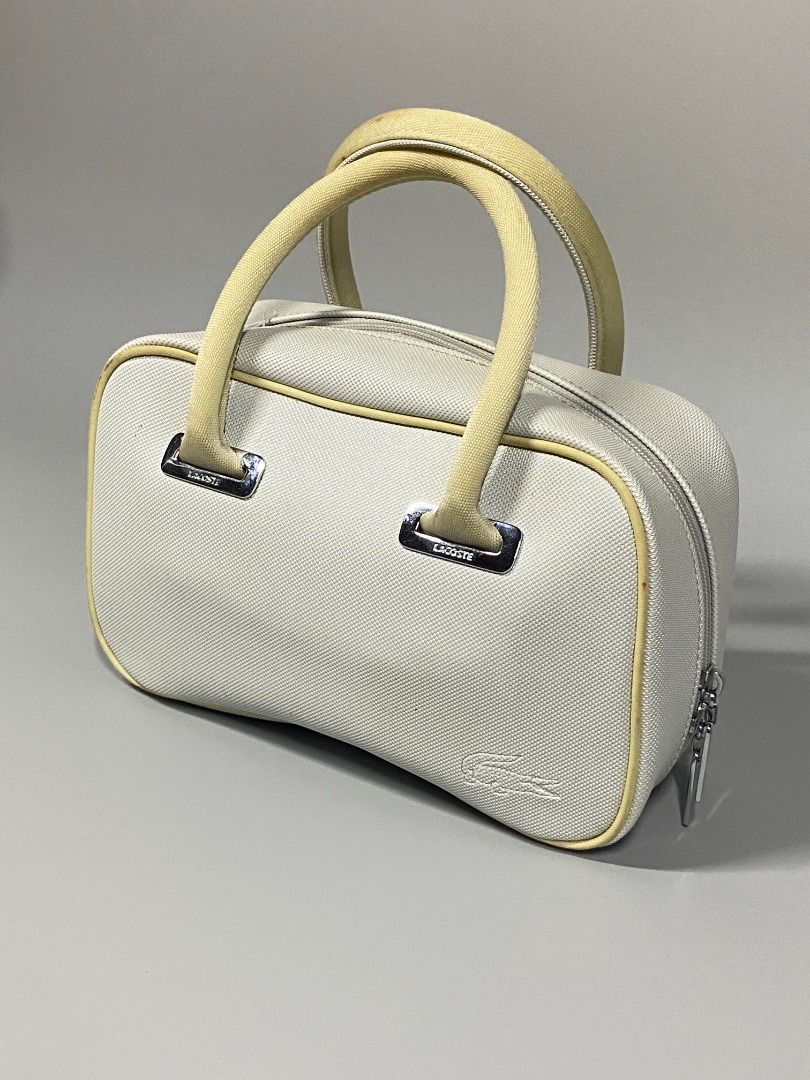 ‘VINTAGE LACOSTE CLASSIC 17 HANDBAG’ (Category: Luxury Bags & Wallets) located in San Jose. Submitted by retro.co (Listing ID 1454700544, Image 2). Description: ‘VINTAGE LACOSTE CLASSIC 17 HANDBAG’ •Excellent Condition •Flaws: YELLOW STAIN ON HANDLE(NEED BAG SPA) NO MAJOR FLAWS •LENGTH: 10 INCH •HEIGTH: 6.5INCH READ BEFORE PURCHASING -Sure Buyers only. -You are given 1-2 days to settle your payment..