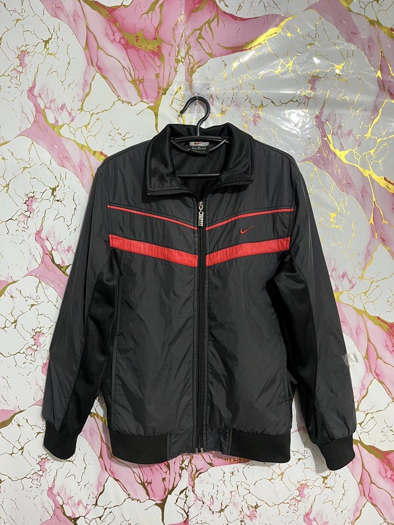 Vintage Y2K Nike ACG Windbreaker Jacket (Category: Coats, Jackets and Outerwear) located in Basud. Submitted by metro_archives.ph (Listing ID 1454725969, Image 1). Description: -Nike Vintage Y2K Windbreaker Jacket -Men’s Size: W-20-21, L-26 -Color Rate: 9.6/10 -VERY GOOD CONDITION -Authentic Nike -Vintage / Y2K-Era Nike Piece -Issue: Fire burn/outline -Black / Red Colorway -Nike Swoosh Logo on Chest -Embroidered Nike Logo on Back -Nike Branded Me
