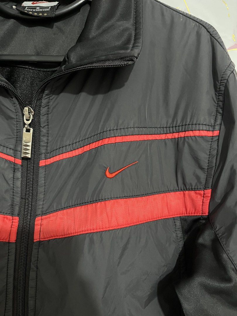 Vintage Y2K Nike ACG Windbreaker Jacket (Category: Coats, Jackets and Outerwear) located in Basud. Submitted by metro_archives.ph (Listing ID 1454725969, Image 3). Description: -Nike Vintage Y2K Windbreaker Jacket -Men’s Size: W-20-21, L-26 -Color Rate: 9.6/10 -VERY GOOD CONDITION -Authentic Nike -Vintage / Y2K-Era Nike Piece -Issue: Fire burn/outline -Black / Red Colorway -Nike Swoosh Logo on Chest -Embroidered Nike Logo on Back -Nike Branded Me