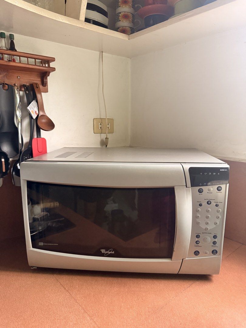 Whirlpool AVM585 Microwave Oven with Grill and Combi Function (Category: Ovens & Toasters) located in Malolos. Submitted by rjhouseofthrifts (Listing ID 1454644191, Image 1). Description: - Condition: Needs repair - Whirlpool AVM585 Microwave Oven - Color: White - Features: Grill and Combi functions, Auto Defrost - Controls: Clock, Cook Time, Auto Cook (Congee, Rice, Vegetables, Baked Potatoes) - Convenience: 1-Minute Button, Stop Function.